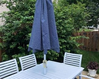 #2) $500 -  White aluminum outdoor patio table with 6 chairs, umbrella, umbrella stand and 6 matching chair cushions.  In excellent condition.  Cushions show some wear.   