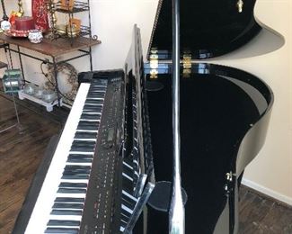 #32)  $400 - Suzuki GP-3 Mini-Grand Digital Piano with Bench.  In working order.  Plays well.  Many electronic settings.  4 keys are lightly sticking.  