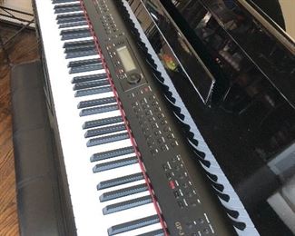 #32)  $400 - Suzuki GP-3 Mini-Grand Digital Piano with Bench.  In working order.  Plays well.  Many electronic settings.  4 keys are lightly sticking.  