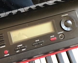 #32)  $400 - Suzuki GP-3 Mini-Grand Digital Piano with Bench.  In working order.  Plays well.  Many electronic settings.  4 keys are lightly sticking.  