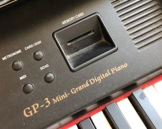 #32)  $400 - Suzuki GP-3 Mini-Grand Digital Piano with Bench.  In working order.  Plays well.  Many electronic settings.  4 keys are lightly sticking.  