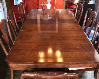#34)  $400 -  Keller double pedestal Dining Table with 2 leaves and 8 Chairs.  Table pads included.  2 chairs are captain chairs with different upholstered seats.  6 chairs are side chairs.  Set shows some wear.  Smoke free home. 