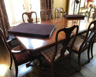 #34)  $400 -  Keller double pedestal Dining Table with 2 leaves and 8 Chairs.  Table pads included.  2 chairs are captain chairs with different upholstered seats.  6 chairs are side chairs.  Set shows some wear.  Smoke free home. 