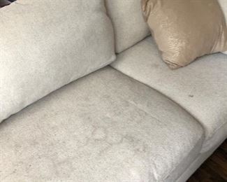 #35) $200 - Sectional sofa with pillows.  Off-white fabric shows wear.  Structurally in good condition.  Smoke Free home.  