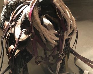 #36)  $350 -  1940's Carved Leather Saddle by Monroe Saddle Company with accessories.  #40 Oklahoma Roper.  Comes with 2 blankets, a bridal headstall, a couple of cinches, ropes, reigns and other assorted leather accessories.  