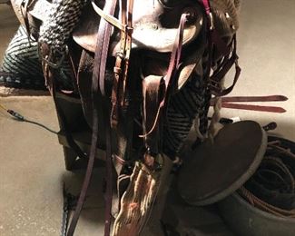 #36)  $350 -  1940's Carved Leather Saddle by Monroe Saddle Company with accessories.  #40 Oklahoma Roper.  Comes with 2 blankets, a bridal headstall, a couple of cinches, ropes, reigns and other assorted leather accessories.  