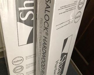 #38)  $50 - 2 Boxes Shaw hard wood flooring.  Dark Brown.  