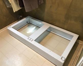 #44)  $75 - Front Loading Washer and Dryer floor base.  