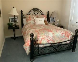 Black metal Queen size bed. Mattress, box spring, nightstands not available.