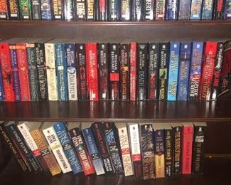 A collection of paperback books. The bookshelf is also available!