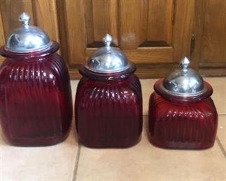 Pretty red glass canisters in perfect condition!