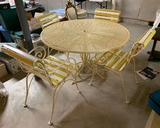 1. Retro Midcentury patio set with yellow and white straps. You get table, 4 chairs and umbrella. All stored inside and I would say extremely nice. Great clean condition. $250