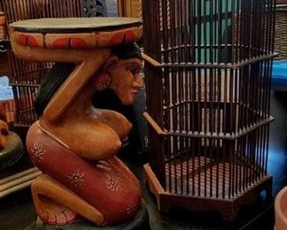 bird cages, carved indonesian goddess