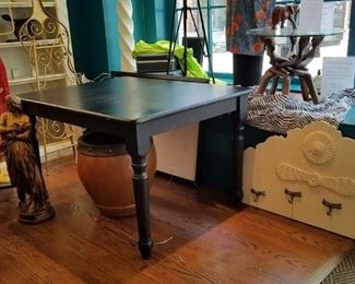 black painted dining table, clothes rack with dragonflies