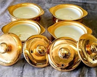 63. Four Hall Pottery Gilt Casserole Dishes