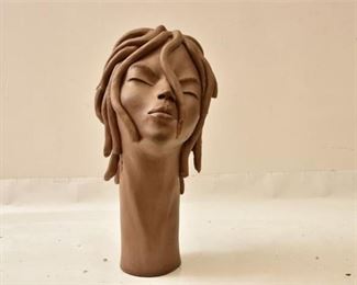 Clay Sculpture Of A Woman