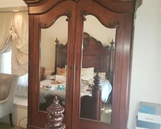 Massive Victorian all original Rosewood Armoire Pierced Carved Crown and 2 Plate Glass Mirrored Doors Attributed to one of the New Orleans Furniture Maker