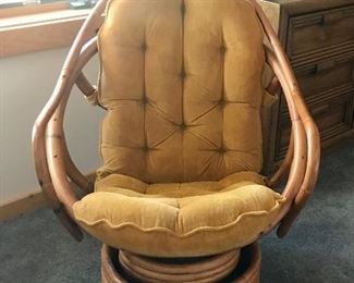 Mid century orange/gold ratan swivel chair