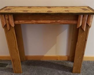 Sofa table with pinecone art top
