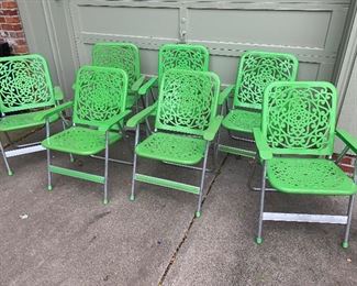 Sun Terrace maker vintage lawn green chairs. 