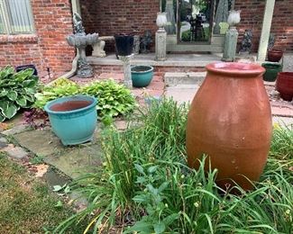 Lots of beautiful yard art, fountains glazed planters.  