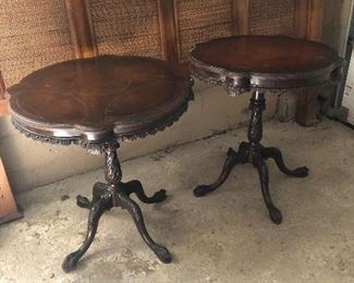 Pair of antique carved pedestal tables