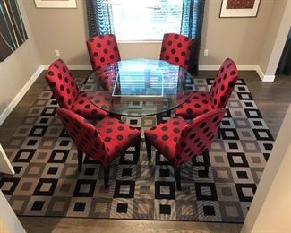 Custom Built Dining Room Table and Chairs.  The 6 Chairs (38H) will sell as a set.   The table will sell separately and includes Glass Top and the Steel Frame. (Glass Top 54L x 1W  x 54H)  