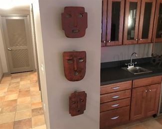 Three One of A Kind Decorative Masks(11L x 4 W x 12H)  Candle holders placed on back stands create light through openings