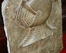 AN ENGLISH BROWN MARBLE ARMORIAL RELIEF FRAGMENT, POSSIBLY EARLY 16TH CENTURY
Depicting a knight's plumed helmet
20 in. high; 13 in. wide; 5 1/4 in. deep