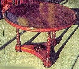 SOLD - A ROSEWOOD CIRCULAR CENTER TABLE
MID-19TH CENTURY
With later French-polished surface, the three barley- twist legs on a concave triangular base with center rosette bun feet
27 in. high; 39 in. diameter                            Appraised Value:  $3000.00