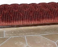 AN IRISH MAHOGANY HALL BENCH, CIRCA 1840
With corded red velour tufted upholstered cushion seat, on turned tapering legs
16 in. high; 52 in. wide; 14 in. deep