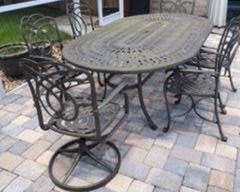 $350 aluminium oval table with six chairs