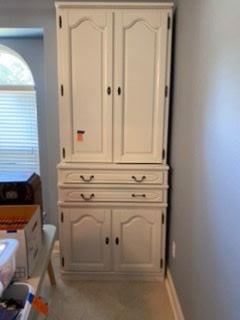 $250 Tall cabinet great for crafts, sewing...
