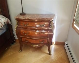 A matched pair, Louis XVI marble top commodes