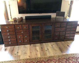 Samsung TV  NOT for sale; however,  cabinet beneath is for sale 