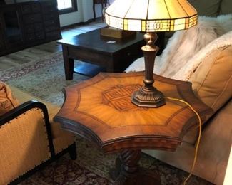 One of many stained glass lamps and high-end inlaid table