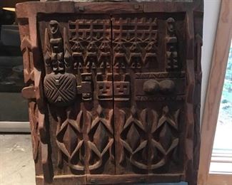 Amazing in person. Carved African door! Could be wall decor, textural art.