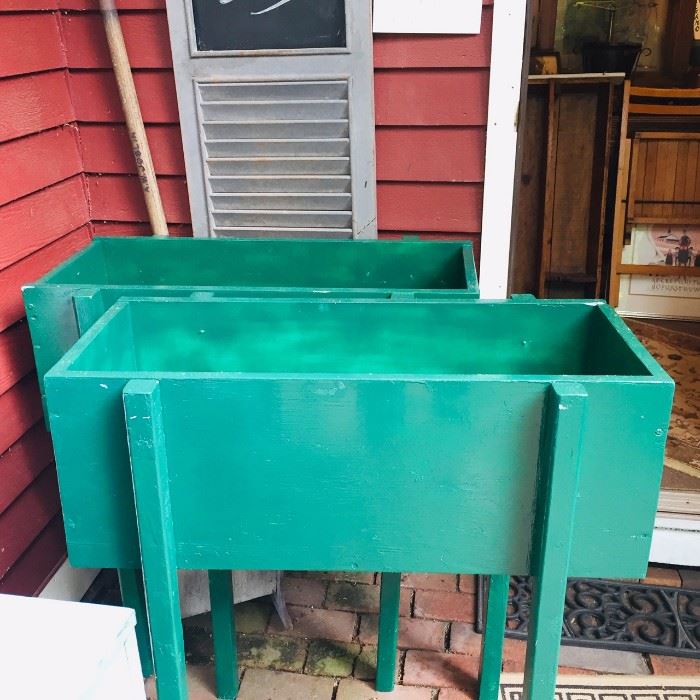 Green is darker than shown. Two large planters hand made wood. Just repainted... $120.00. Includes can of touch up paint! 