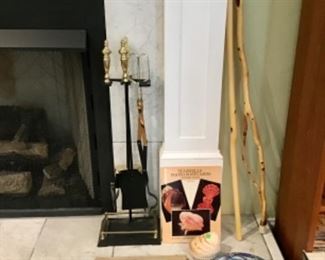 Walking sticks, old model boats in the boxes, fish tin, shell, fireplace tools, books 