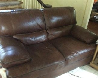 Leather Sofa. Ask to see it. It’s inside the house