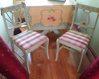 Hand painted table with 4 matching  chairs 