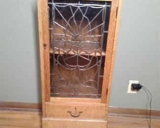 antique stand with leaded glass