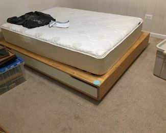 Queen base with sliding drawers each side (mattress available)