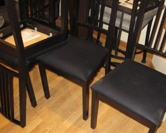 4 black wooden dining chairs