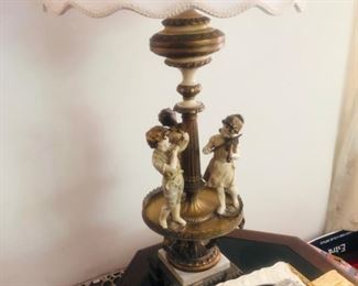 Lamp with three children playing instruments in circle $55  Side table $48