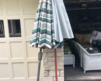 Umbrellas for patio tables. One stand is available!