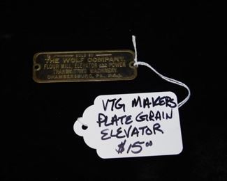 The Wolf company vintage marker plate