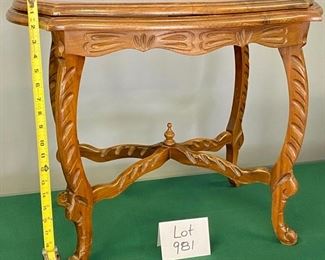 Lot 981.  Buy it Now $120.00  Decorative Antique Carved table with removable glass in tray - Oak ornate piece.  