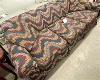 Lot 997  $275.00	Isenhour Furniture Southwest Flame Couch with 2 Matching Pillows	84"L x 30"H x 36 D