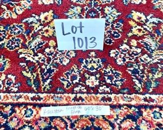Lot 1013 	Buy it Now $85.00  Karastan. Small throw rug, red, tan, pinks and blues. damage on 2 corner fringe (check out picture)	60" l x 30" w